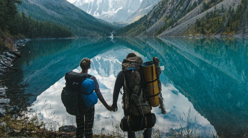 backpacking routes in British Columbia for beginners - tent pitched on a mountainside at night
