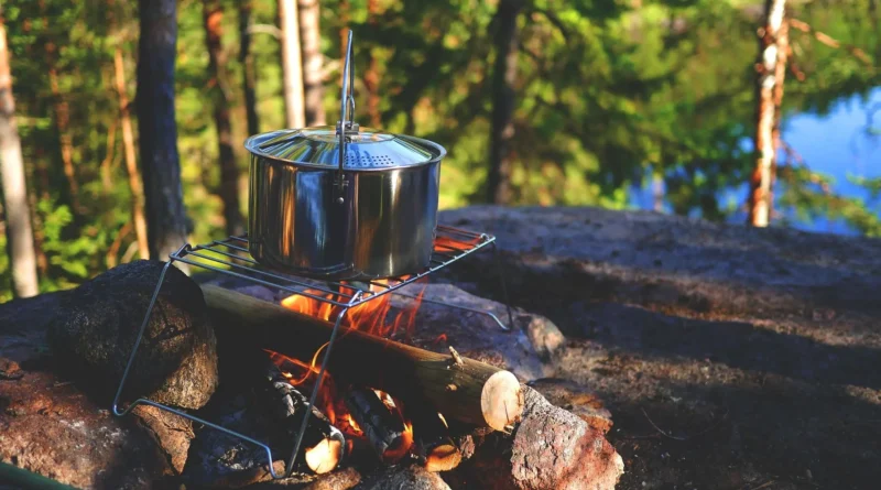 camping gear checklist for Canadian summer trips - gear laid out beside a tent